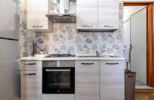 Torre Ovo Apartment | Apartment 'Casa Vacanze Le Barche Due' with Private Terrace and Air Conditioning