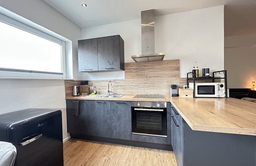 Mahlberg Apartment | Lumiflats: Deluxe Studioapartment mit Terrasse und Garten Nähe Europapark