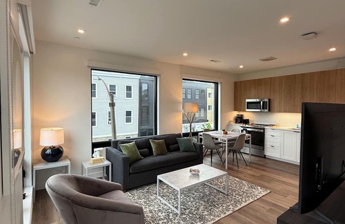 East Boston Apartment | Luxury 1BR w/Rooftop 5 min to Logan Airport Free EV Garage Parking