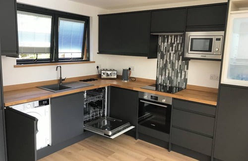 Worth House | Executive retreat getaway featuring Professional hot tub. Hydropool luxury.