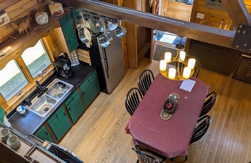 Wiscasset House | Charming riverfront home with cozy interiors, dock, and scenic deck views
