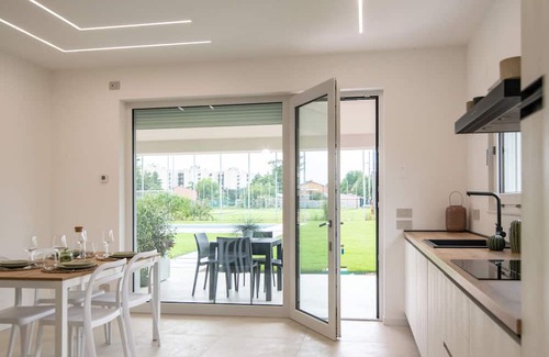 Borgo Milano Apartment | Armonia Suites Terra, new apartment with garden and pool in Verona