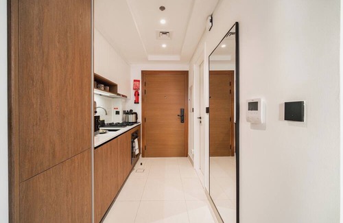Dubai Apartment | Quiet Top-Floor Studio Near Metro + Baby Gear