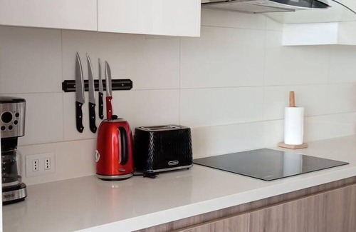 Renaca Apartment | Infinite Coast 2BR with pool, gym & free parking