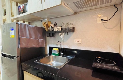 Iloilo Condo | Convenient City Hub with Relaxing Interior