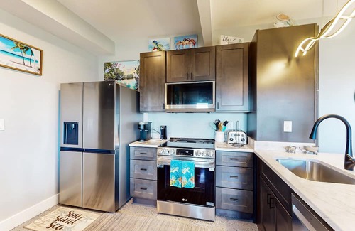 Colington Harbour Condo | Bay-view 1BR with outdoor shower and fishing access