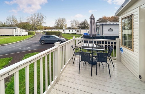 Burnham-on-Sea Apartment | Spacious caravan sleeps six, with private decking and master ensuite.