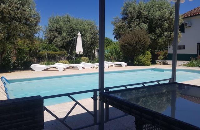 Private 2 bed apartment solar heated swimming pool