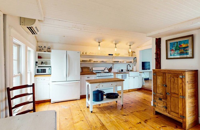 Tranquil Riverfront Homes with Rustic Charm and Modern Comforts