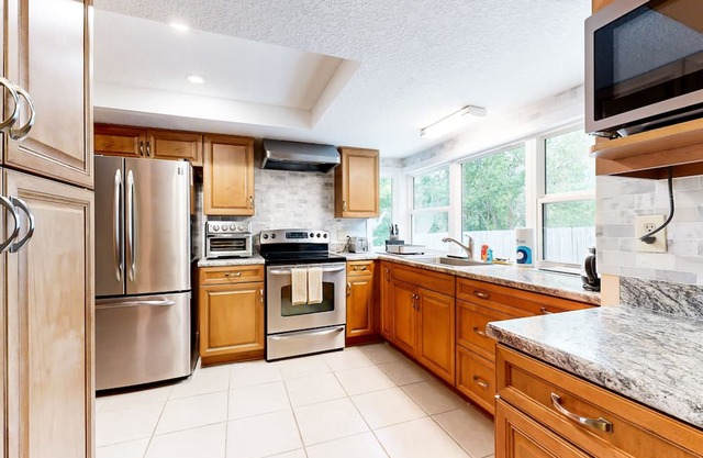 Charming retreat with a large patio, yard & central AC