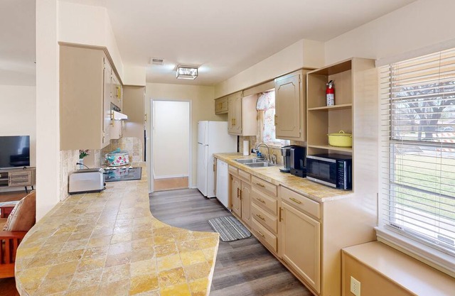 Spacious home with front/back yards & great location near downtown