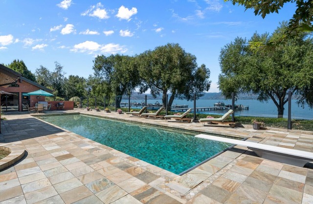 Lakefront Grandeur: Okanagan Home With Pool & Tennis Court