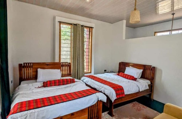 Double G safaris and Camp Mikumi - Luxury Triple Room 2