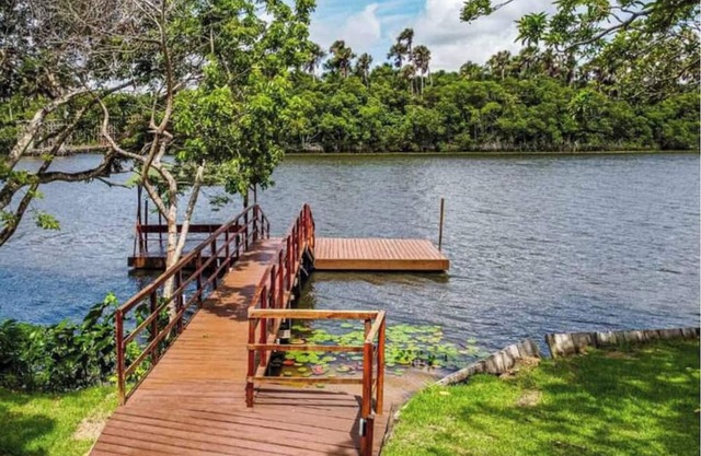 Riverfront with pier and pool