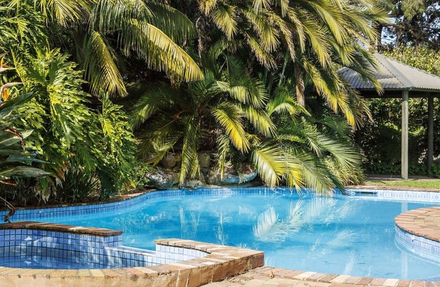 Poolside Palms Oasis