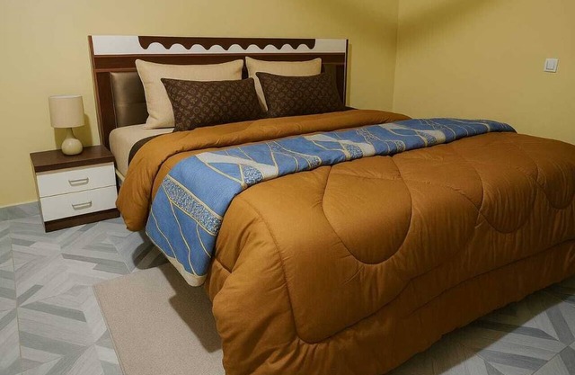 Chic 1-bedroom apartment with fitness room and AC in Kasoa