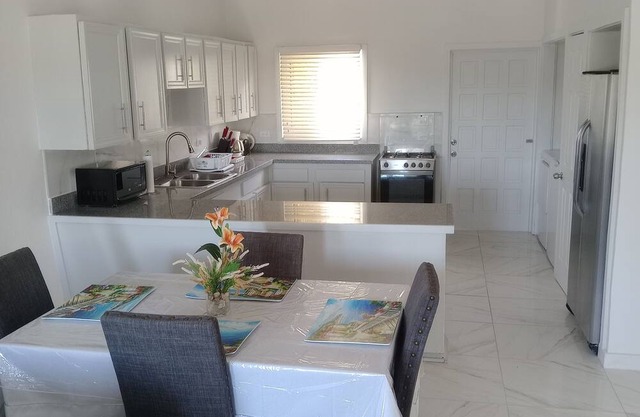 Charming unit 1 & 2- 2 bedroom apartment in cool Rock Sound with AC