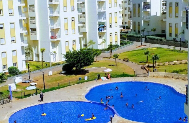 Recent apartment in secure residence with garden and swimming pools