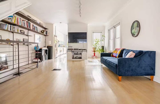Spacious, artful 4-bedroom house in Brooklyn with lush backyard, parking, A/C